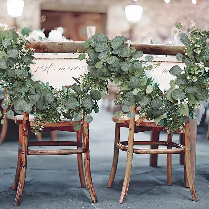 SOMYTING Artificial Eucalyptus Garland with White Flowers 2 Packs 5.9Ft Silver Dollar Leaves Eucalyptus Garland Faux Greenery Vines for Wedding Arch Table Runner Mantle Party Room Decor