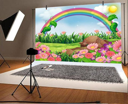 AOFOTO 5x4ft Cartoon Spring Flowers Rainbow Backdrop Meadow Sweet Floral Blossom Sky Sun Enchanting Garden Scenery Background for Kids Baby Shower Birthday Party Decor Wallpaper Photoshoot Props