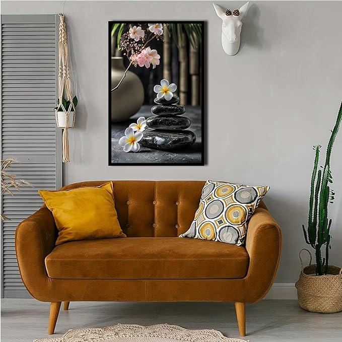 A harmonious black stone stack paired with white and pink flowers bamboo and ceramic vases creates a tranquil Zen decor for minimalist homes and mindful spaces 20x30in Metal blackFramed