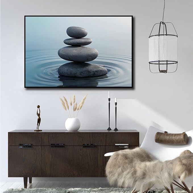 Zen wall art Harmonious grey stones stacked on a calm surface of water Serene Zen decor suitable for tranquil homes and spaces of meditation 24x36in Metal blackFramed