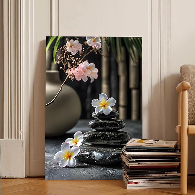 A harmonious black stone stack paired with white and pink flowers bamboo and ceramic vases creates a tranquil Zen decor for minimalist homes and mindful spaces 28x40in Wood Framed