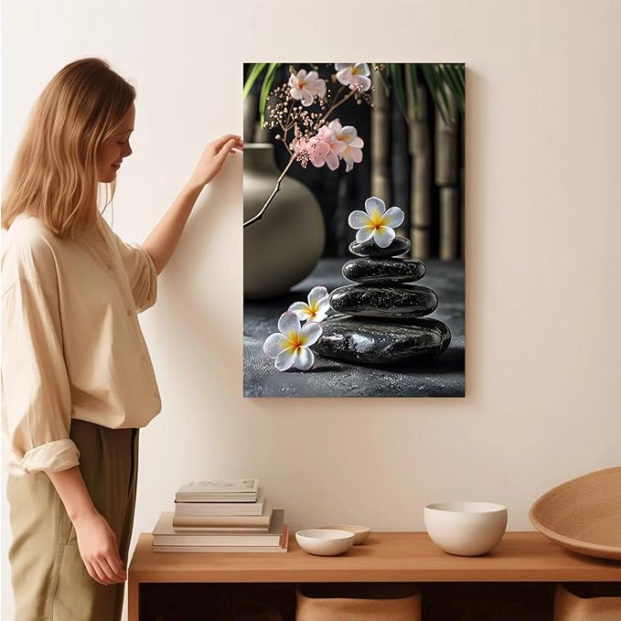 A harmonious black stone stack paired with white and pink flowers bamboo and ceramic vases creates a tranquil Zen decor for minimalist homes and mindful spaces 24x36in Wood Framed