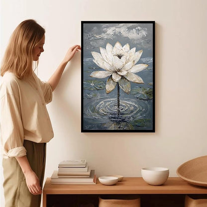 Stunning white lotus emerges from prismatic water with delicate petals background Serene aquatic wall art suitable for modern minimalist decor 8x12in Metal blackFramed