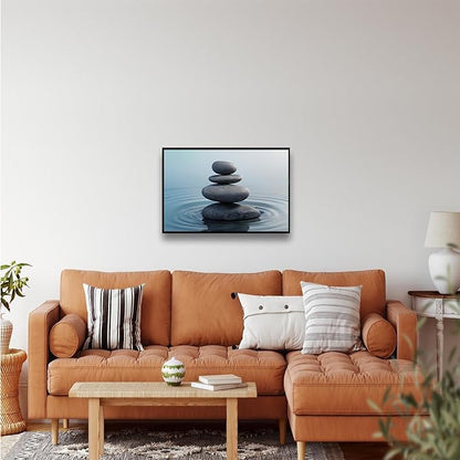 Zen wall art Harmonious grey stones stacked on a calm surface of water Serene Zen decor suitable for tranquil homes and spaces of meditation 16x24in Metal blackFramed