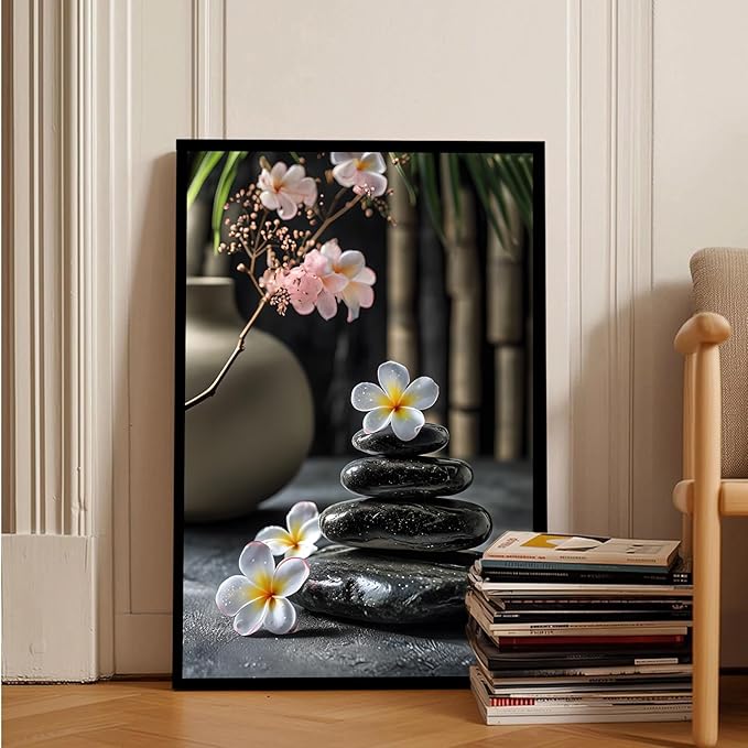 A harmonious black stone stack paired with white and pink flowers bamboo and ceramic vases creates a tranquil Zen decor for minimalist homes and mindful spaces 24x36in Metal blackFramed