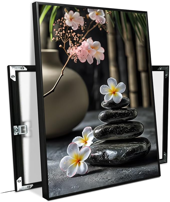 A harmonious black stone stack paired with white and pink flowers bamboo and ceramic vases creates a tranquil Zen decor for minimalist homes and mindful spaces 16x24in Metal blackFramed