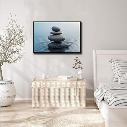 Zen wall art Harmonious grey stones stacked on a calm surface of water Serene Zen decor suitable for tranquil homes and spaces of meditation 24x36in Metal blackFramed