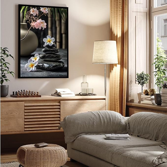 A harmonious black stone stack paired with white and pink flowers bamboo and ceramic vases creates a tranquil Zen decor for minimalist homes and mindful spaces 8x12in Metal blackFramed