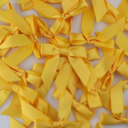 7Rainbows 50pcs Boutique 1.5" Yellow Gold Satin Ribbon Mini Bows for Craft Sewing Scrapbooking Wedding and Gift Wrapping