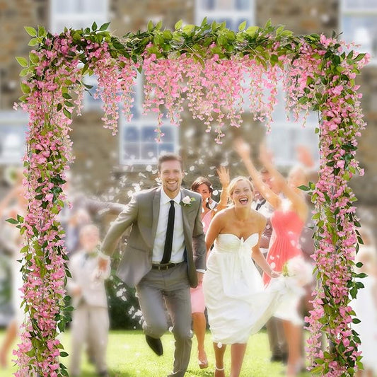 Lvydec Wisteria Artificial Flowers Garland, 4 Pcs Total 28.8ft Artificial Wisteria Vine Silk Hanging Flower for Home Garden Outdoor Ceremony Wedding Arch Floral Decor (Pink)