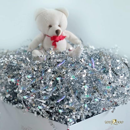 UNIQOOO 1/2 LB Metallic Iridescent Silver Crinkle Cut Paper Shredded Filler, Sparkle Crystal Unicorn Silver Paper Shreds Raffia Tissue, Craft Bedding Cushion, For Christmas Gifts Wedding Birthday