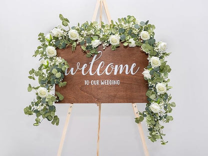 6FT Artificial Eucalyptus Garland with Flowers, 10 White Roses Baby Breath Garland Floral Greenery for Wedding Party Centerpiece Table Runner Backdrop Wall Decor Decoration