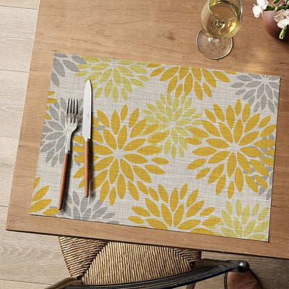 Artoid Mode Floral Plastic Placemats Set of 6, 12x18 Inch Washable Non-Slip Plastic Vinyl Place Mats for Party Kitchen Dining Decor, Yellow
